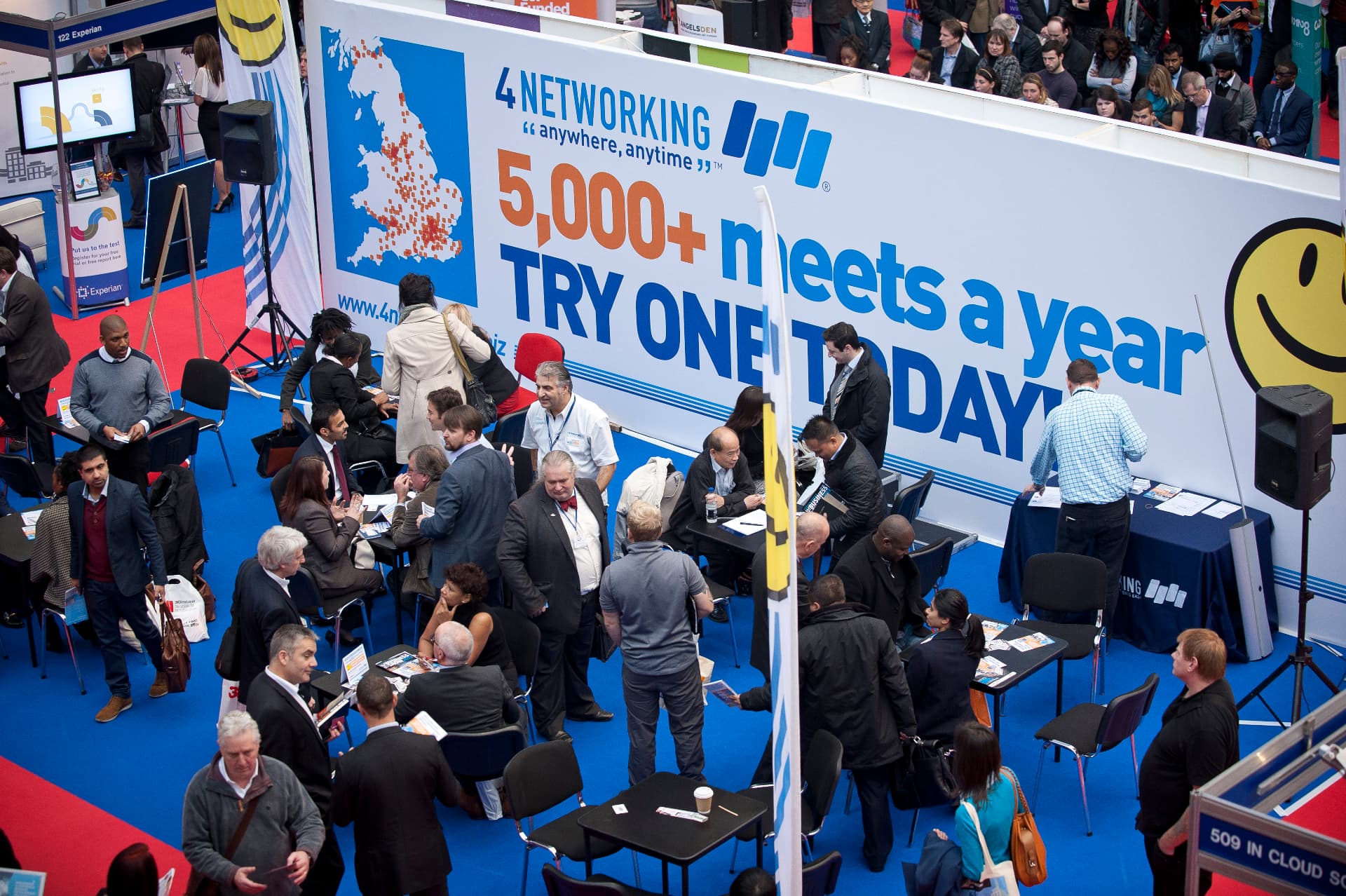 Business owners networking at a 4Networking exhibition