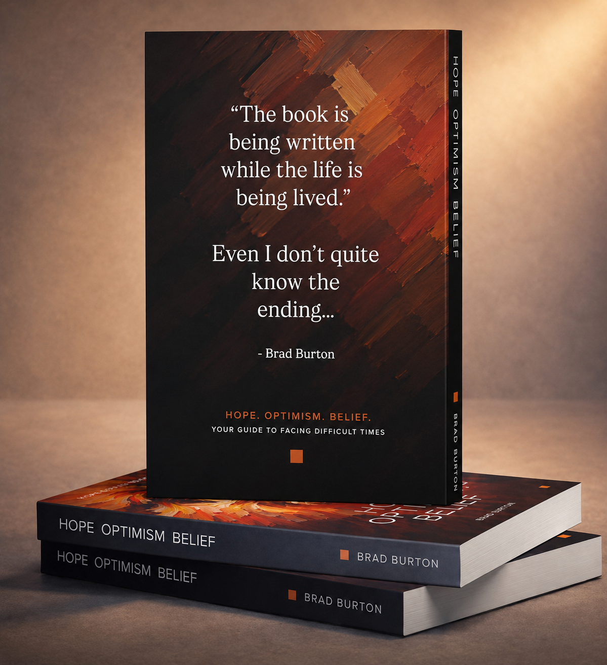 A stack of Hope. Optimism. Belief. copies showing the back cover quote