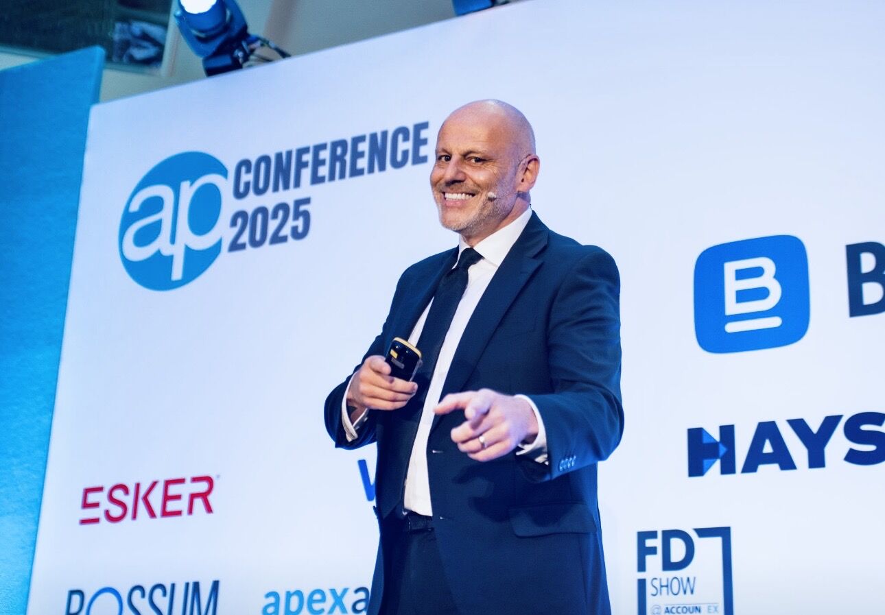 Brad on stage at AP Conference 2025