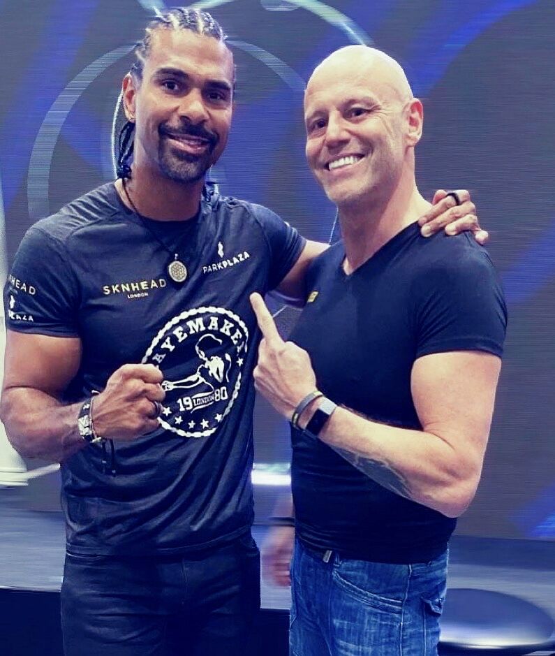 Brad Burton with former heavyweight world champion David Haye, both in Hayemaker tees, arms around shoulders